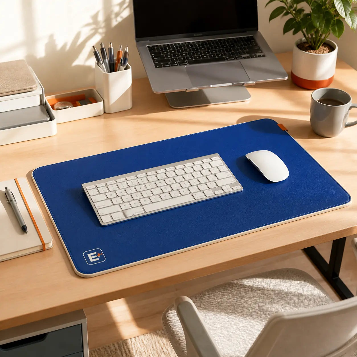 Desk mat anchoring a coordinated workspace